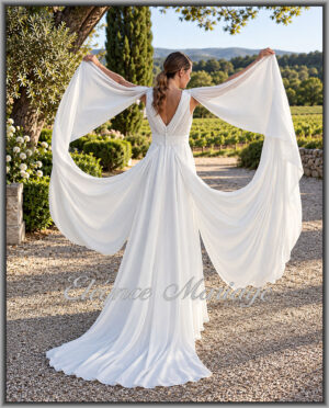 ILIOS robe de mariée fluide avec longs pans aux épaules dans le Pays Basque