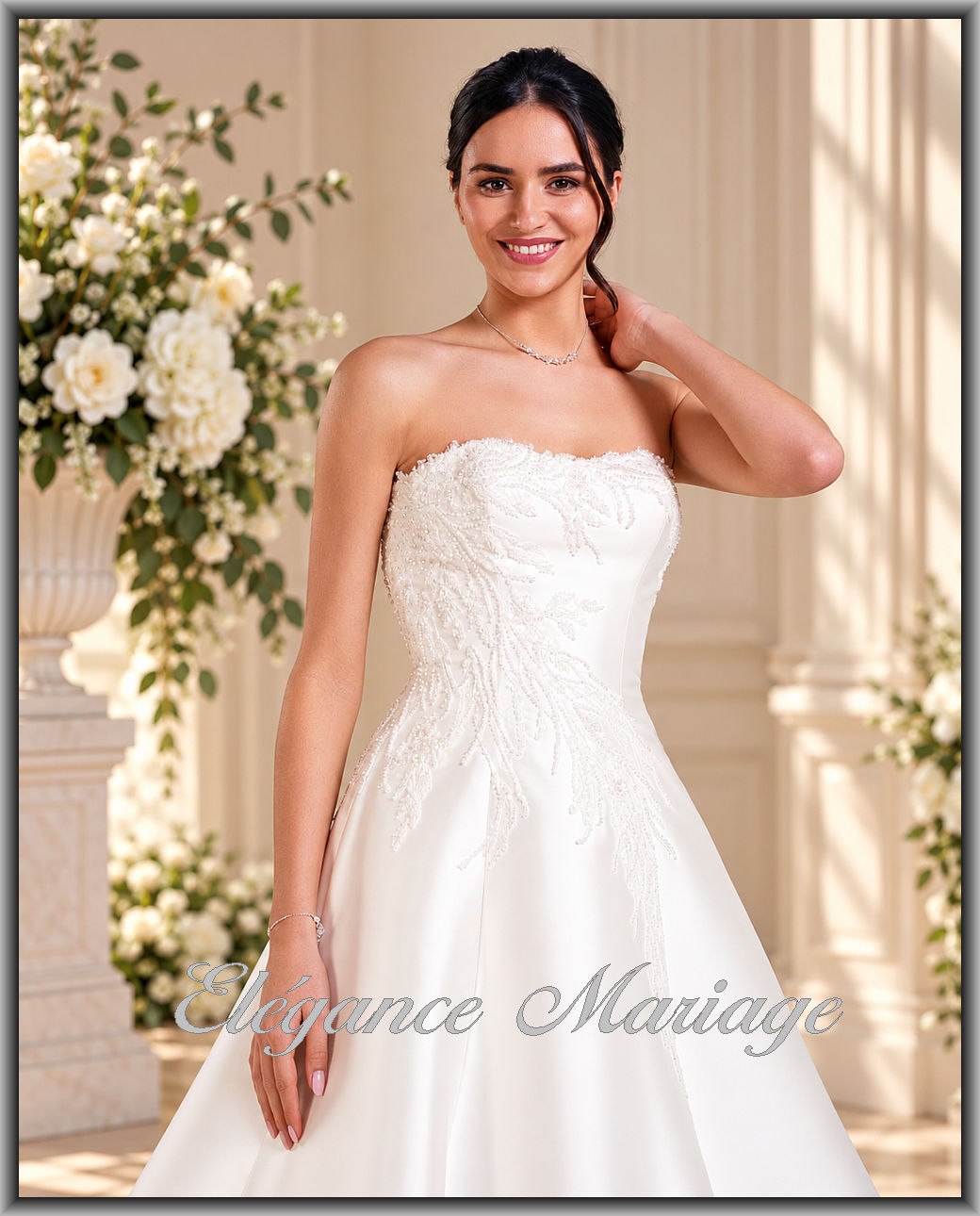 ivoire.jpg Robe de mariée ivoire avec bustier travaillé et détails lumineux